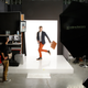 A dapper fellow in orange pants poses backstage at Amazon Fashion Studio Sessions 2014